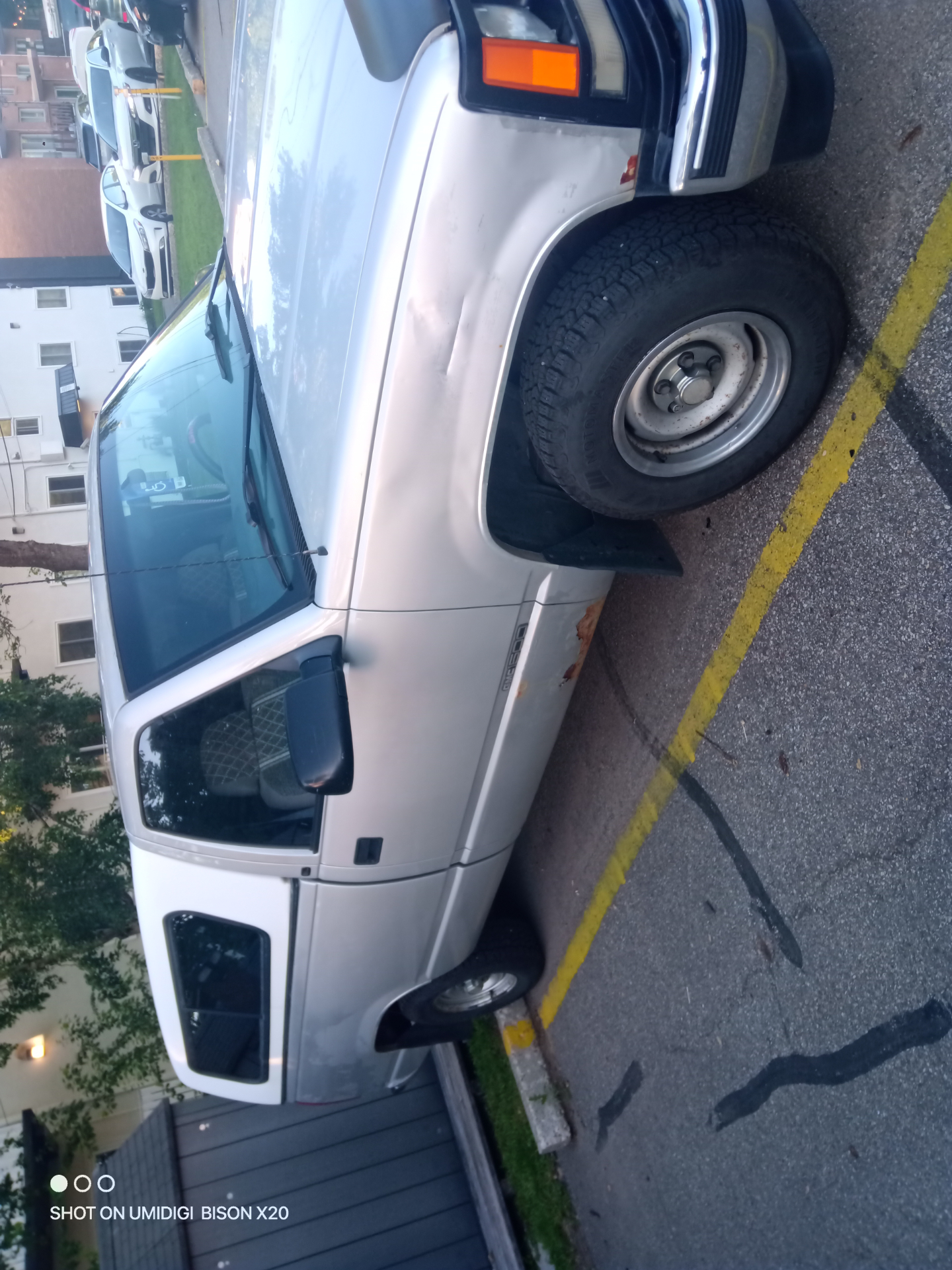 Driver side view showing body condition before repair