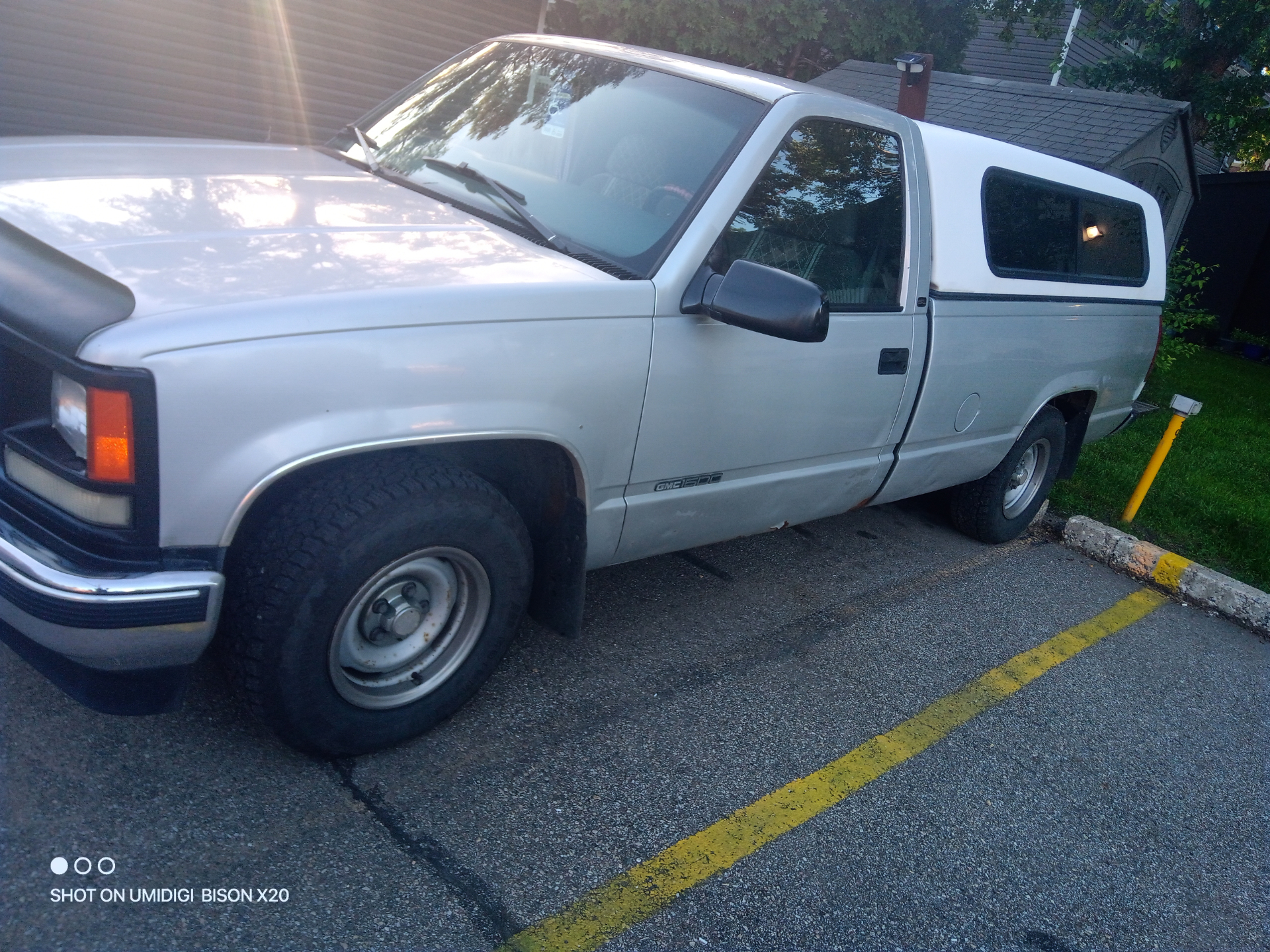 Full side profile of the GMC project truck