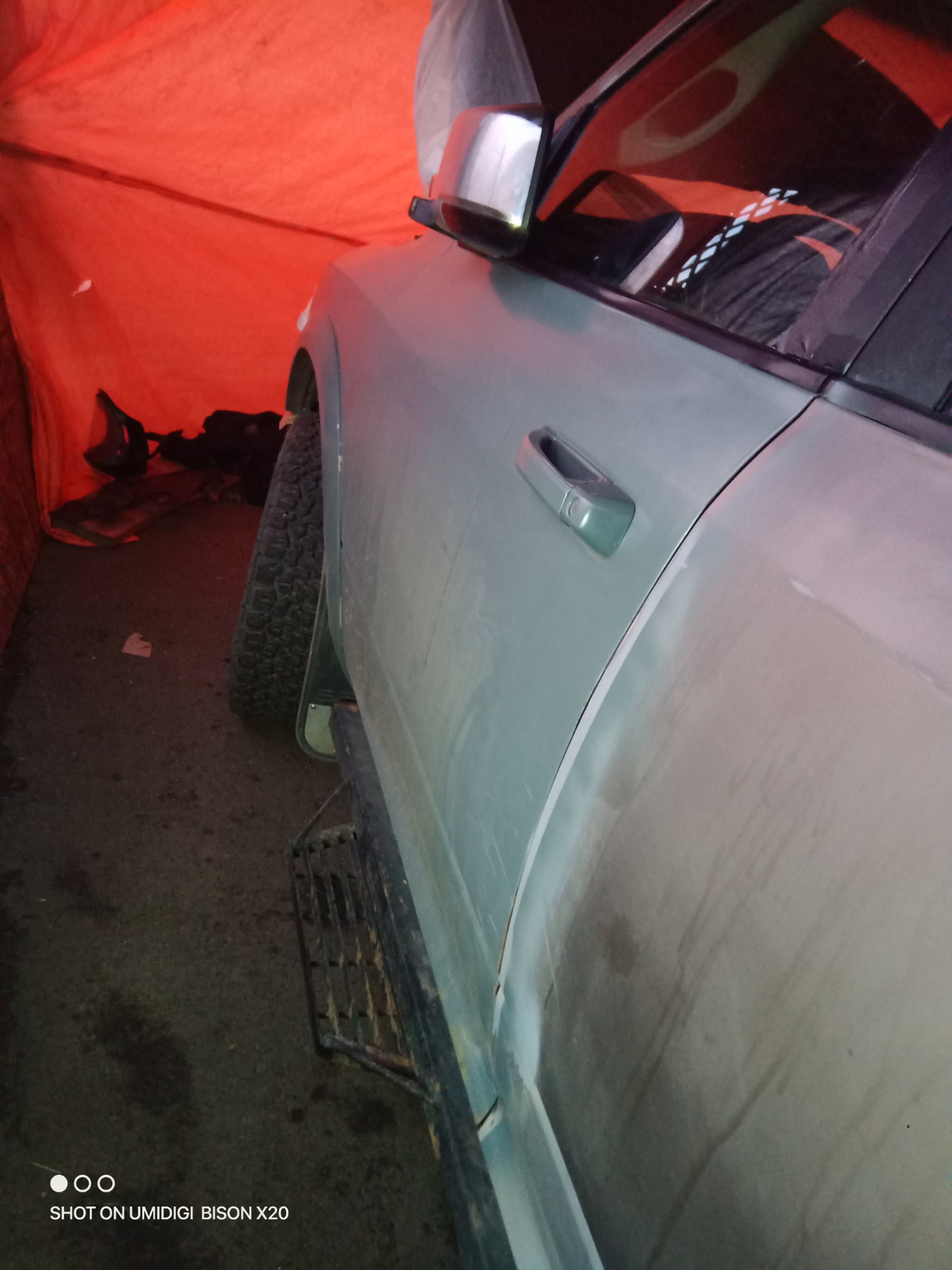 Side profile of vehicle in the paint booth