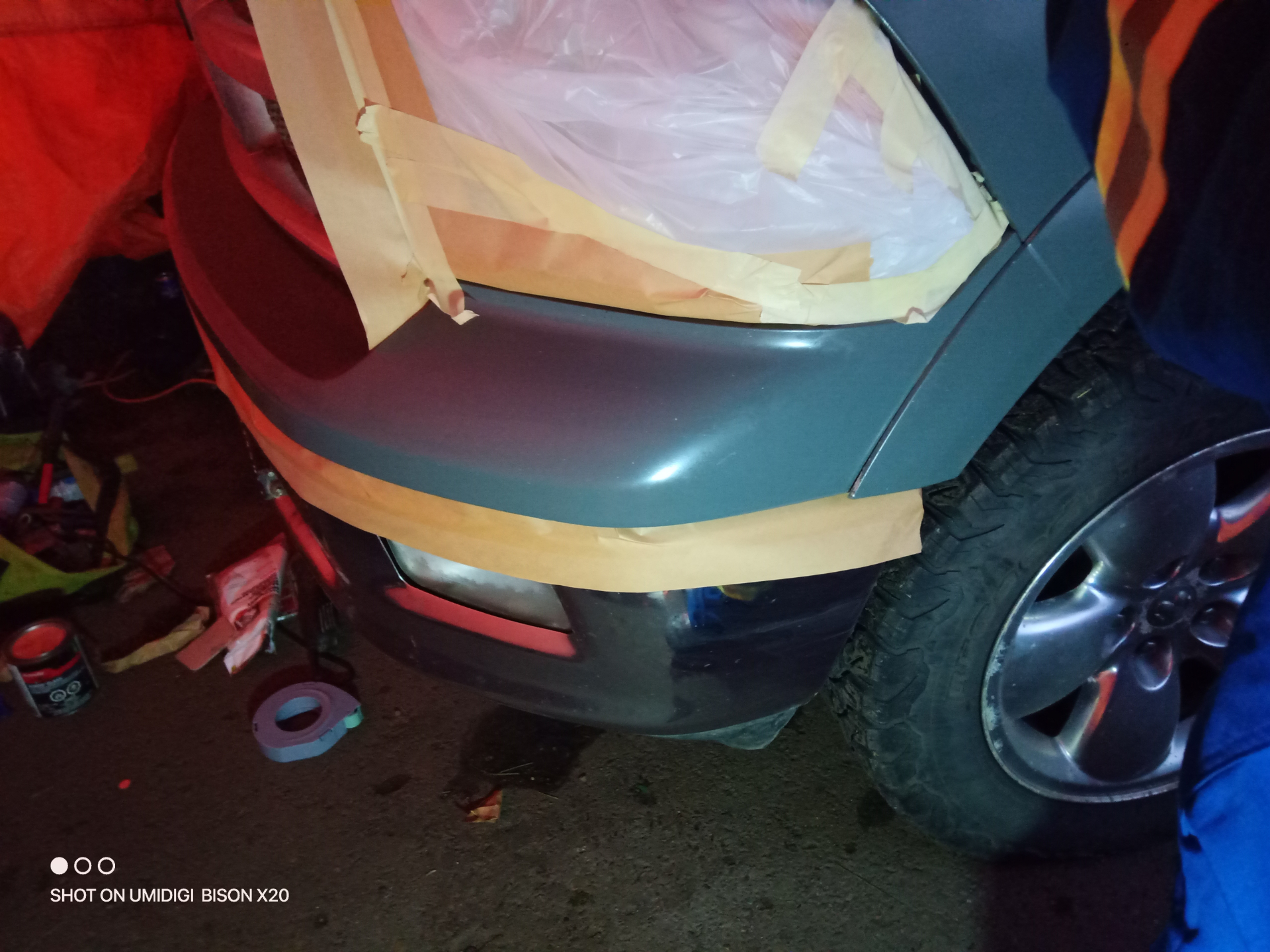 Front bumper prepped and masked for paint