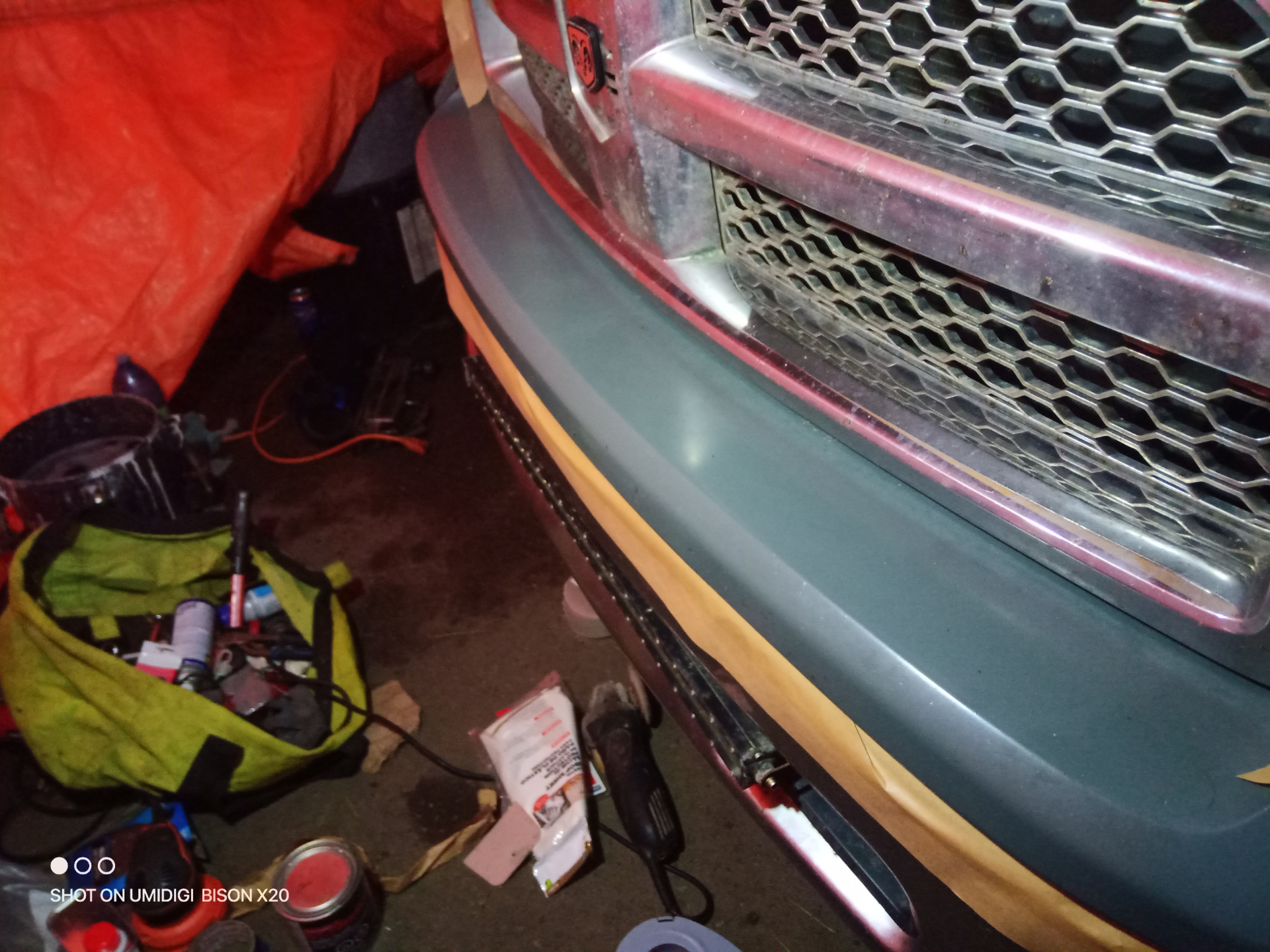 Front end masking around the grille
